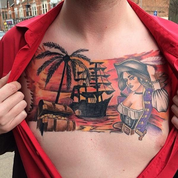 Female captain and pirate ship chest tattoo