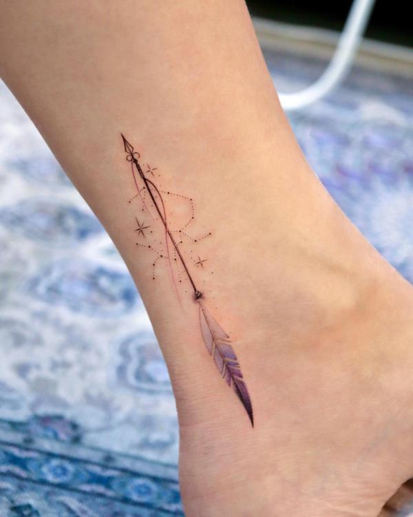 Feminine Sagittarius arrow and constellation tattoo