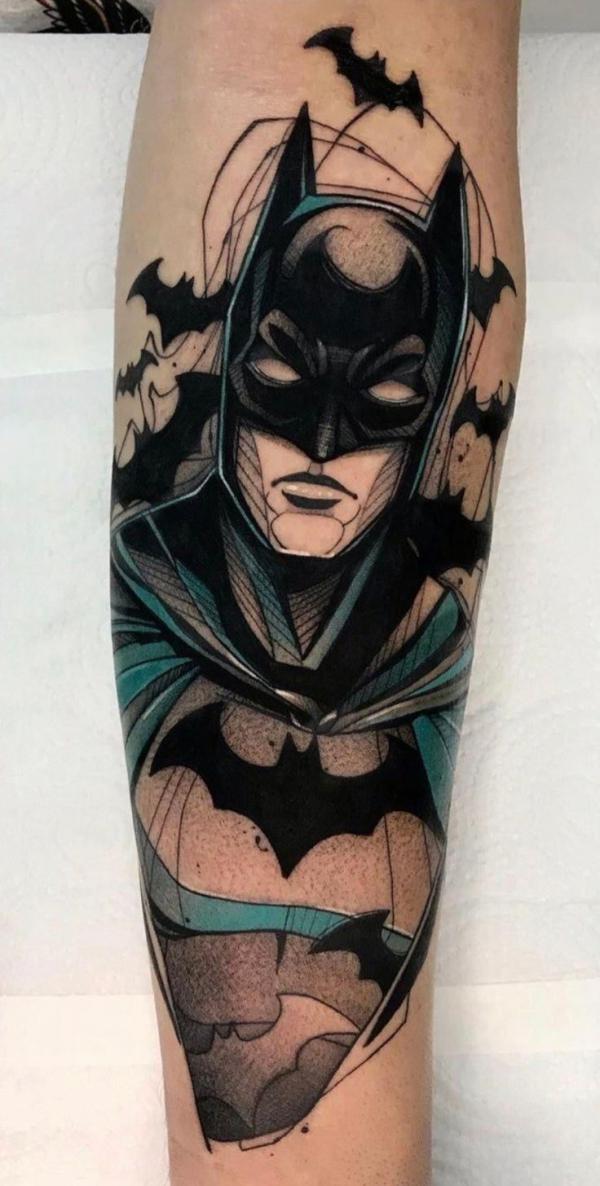 Forearm batman and bats tattoo