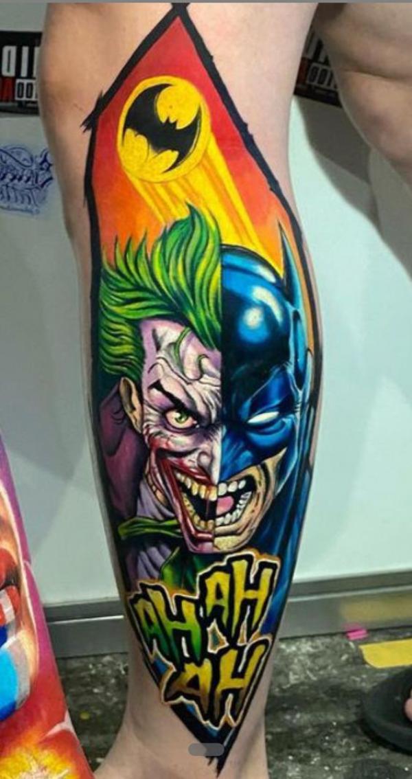 Half batman half joker calf tattoo