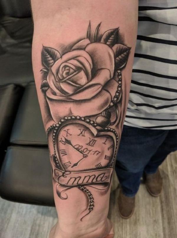 Heart clock and rose with name tattoo forearm