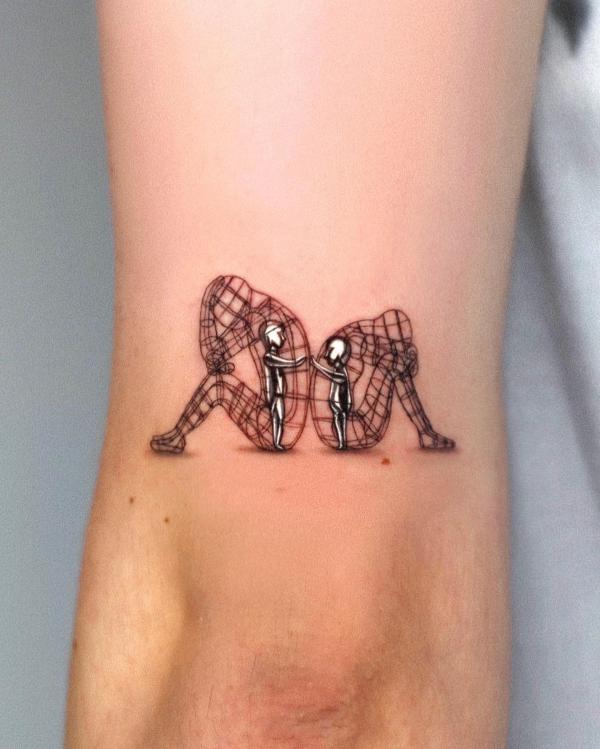 Inner child love tricep tattoo