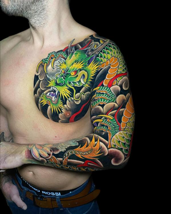 Japanese dragon chest to arm tattoo