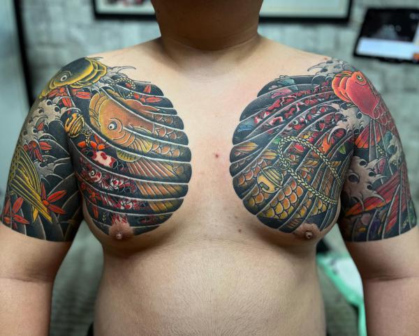 Koi fish chest tattoo
