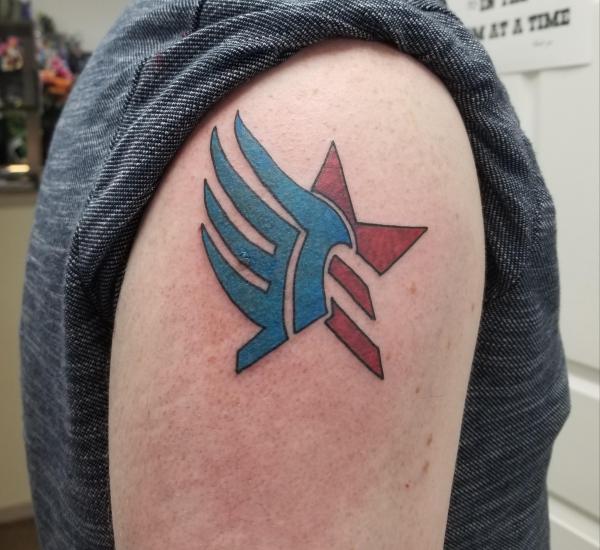 Paragon and Renegade Symbols tattoo shoulder
