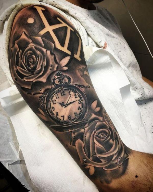 Pocket watch and roses half sleeve tattoo