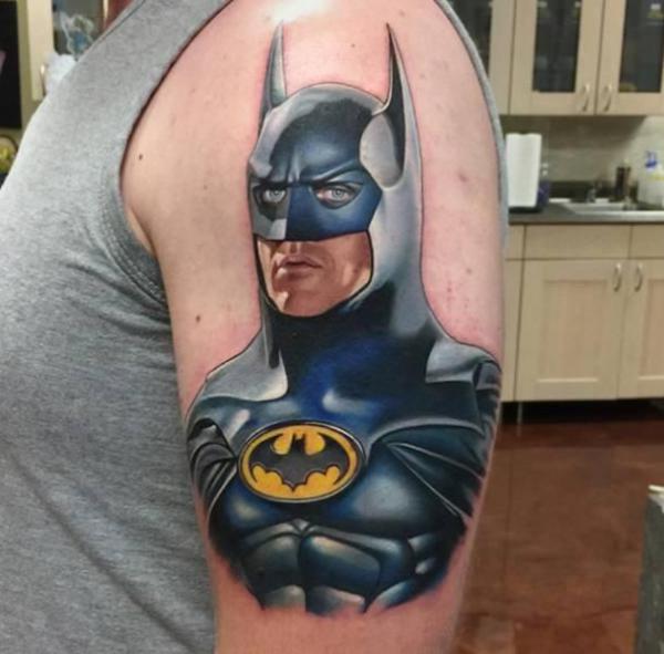 Realistic batman tattoo upper arm