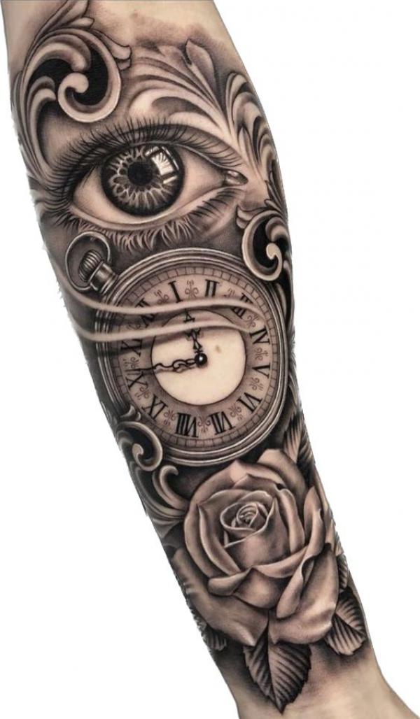 Realistic eye with rose and pocket watch tattoo