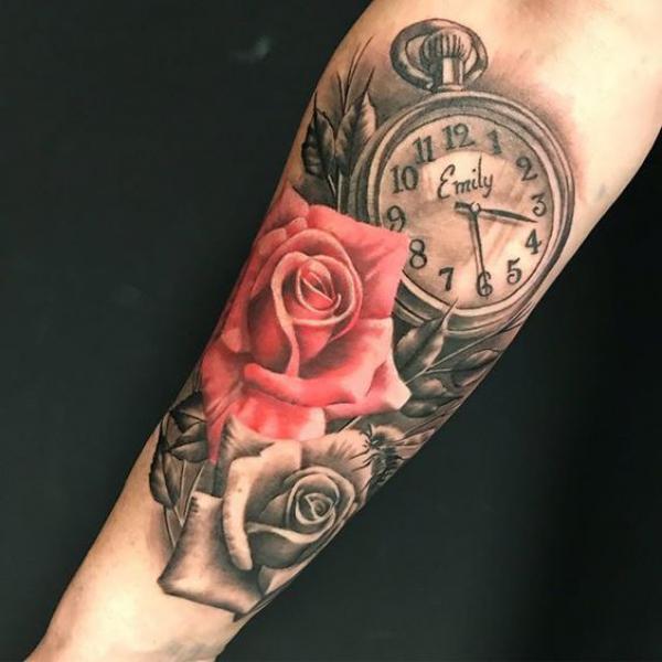 Red and grey rose and pocket watch tattoo forearm