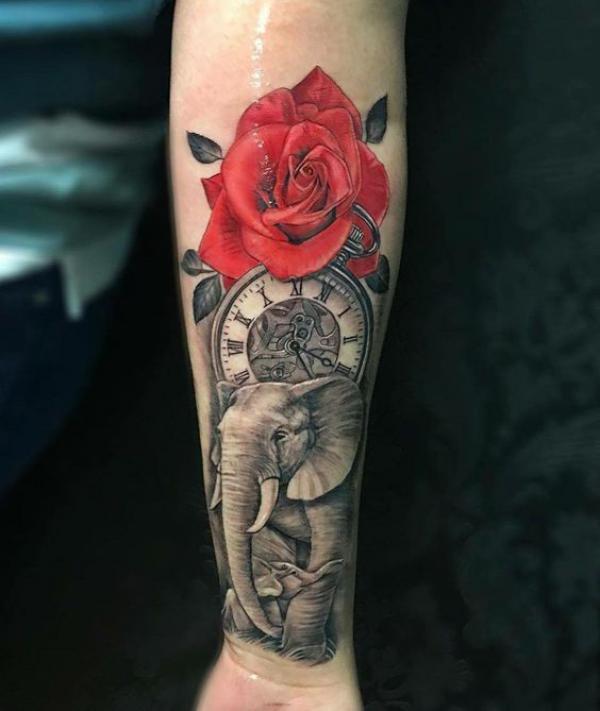 Red rose and pocket watch with realistic elephant tattoo