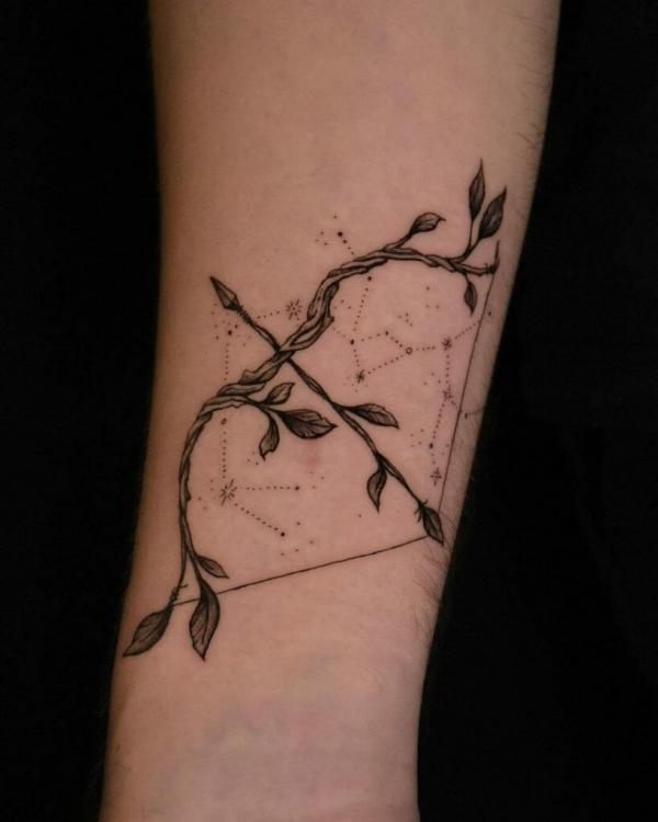 Sagittarius bow and arrow with constellation tattoo