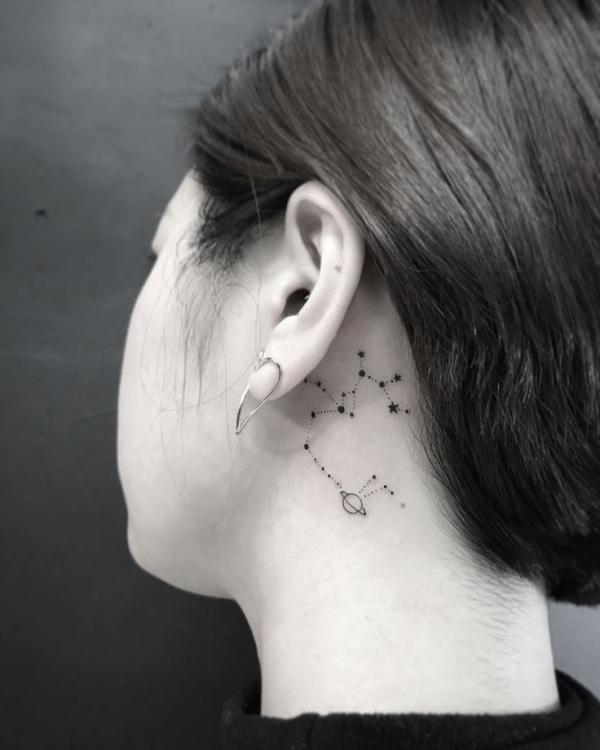 Sagittarius constellation tattoo behind ear 1