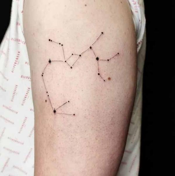 Sagittarius constellation tattoo upper arm