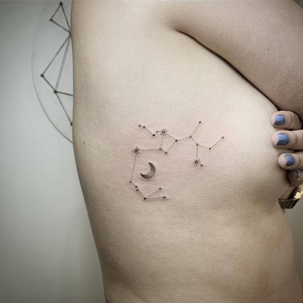 Sagittarius constellation with crescent moon tattoo side boob