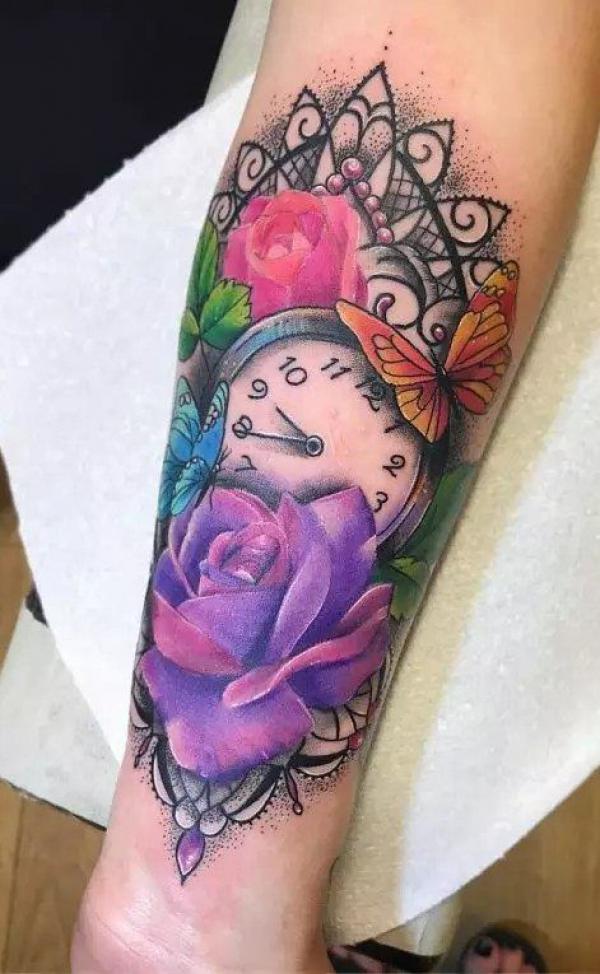 Small clock and purple rose with butterfly tattoo