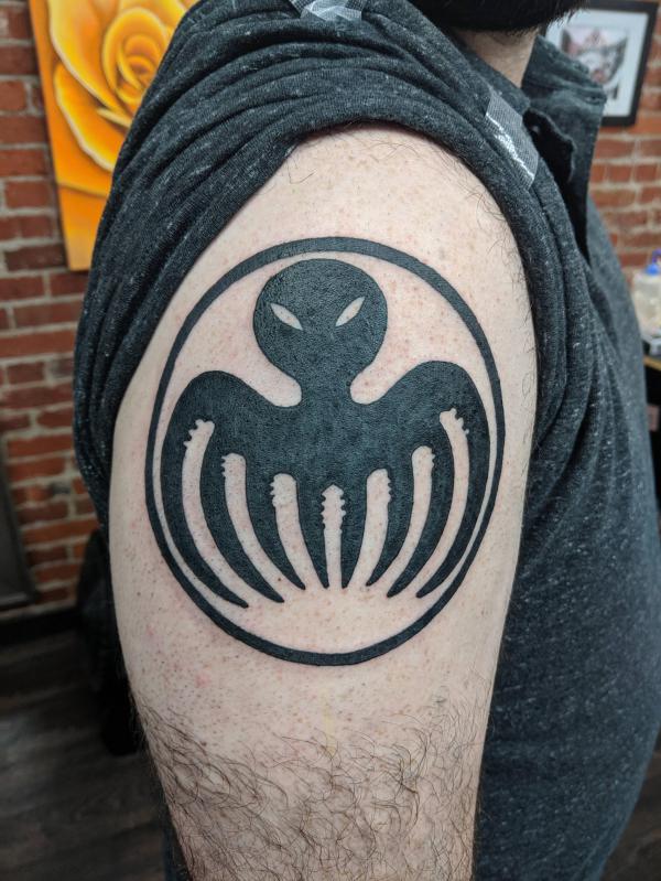 Spectre Emblem tattoo shoulder