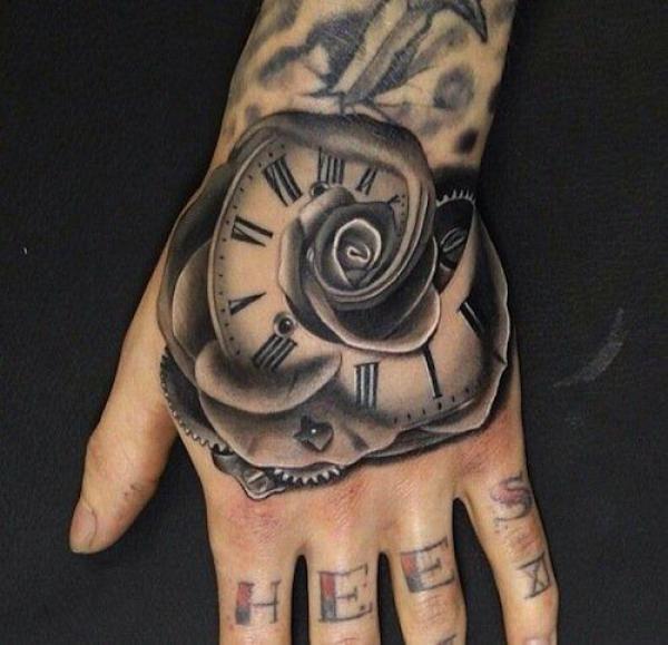 Spiral rose clock hand tattoo