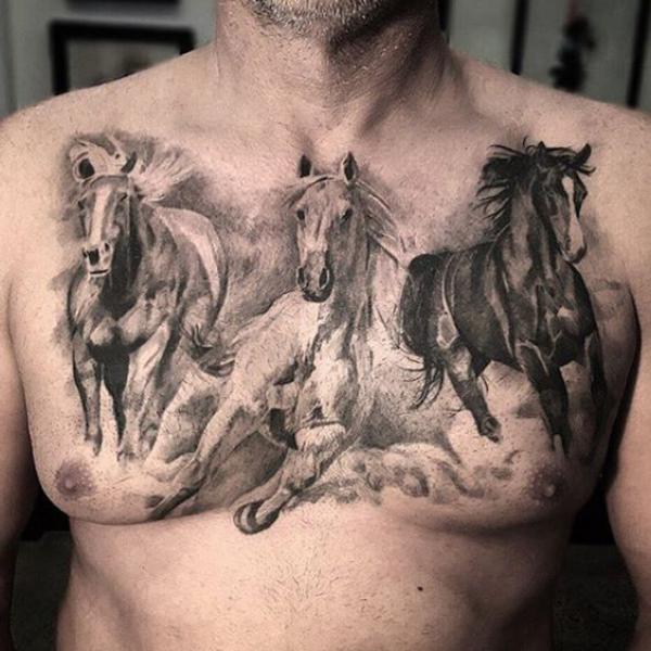 Three running horses chest tattoo