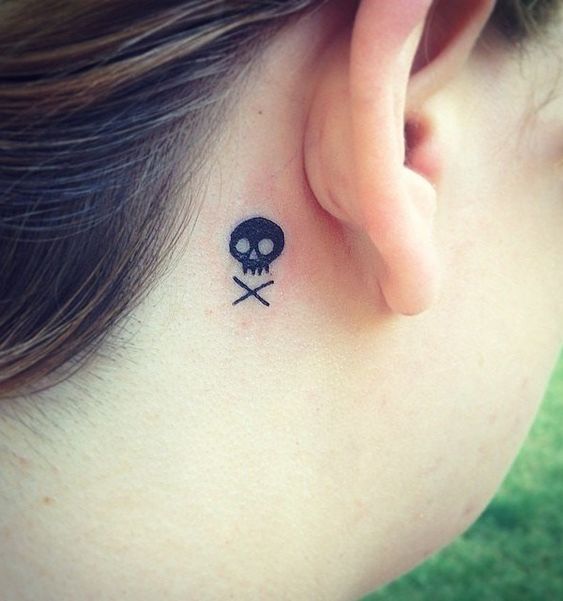Tiny Jolly roger behind ear