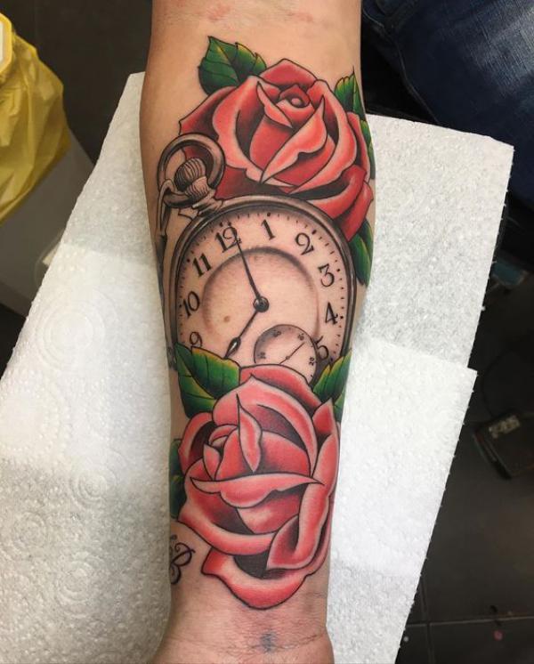 Traditional rose and pocket watch tattoo forearm