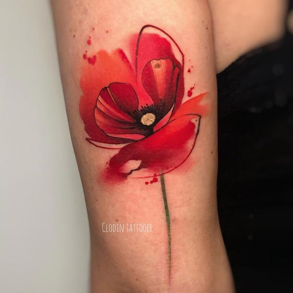 Watercolor poppy tricep tattoo