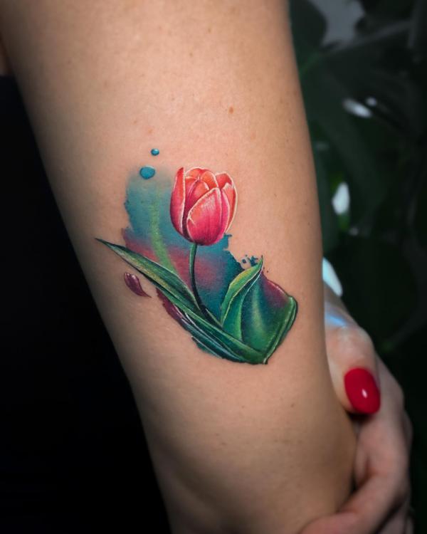 Watercolor tulip tricep tattoo