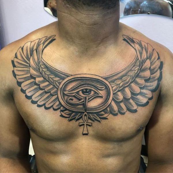 Winged Sun Disk with eye of Ra ans Ankh chest tattoo