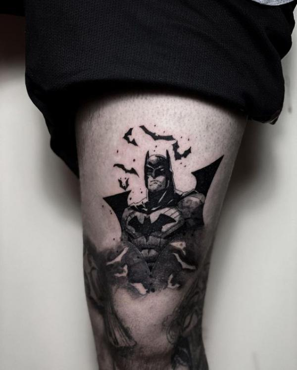 batman and bats tattoo above knee