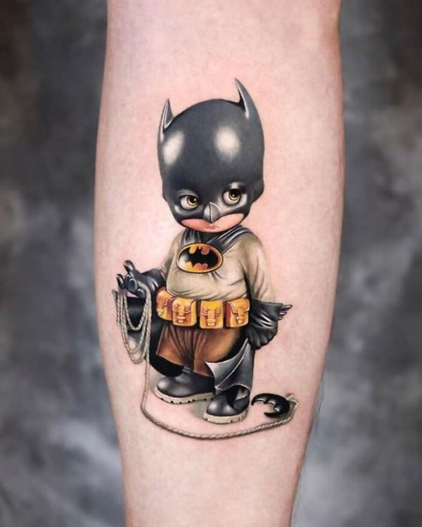 batman cartoon tattoo forearm