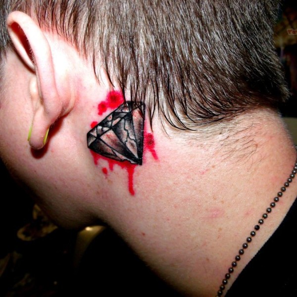 blood diamond tattoo behind ear