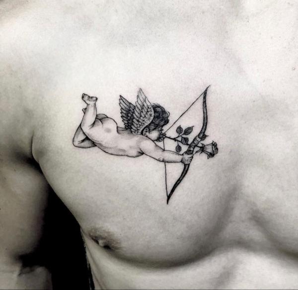 cupid cherub tattoo on chest