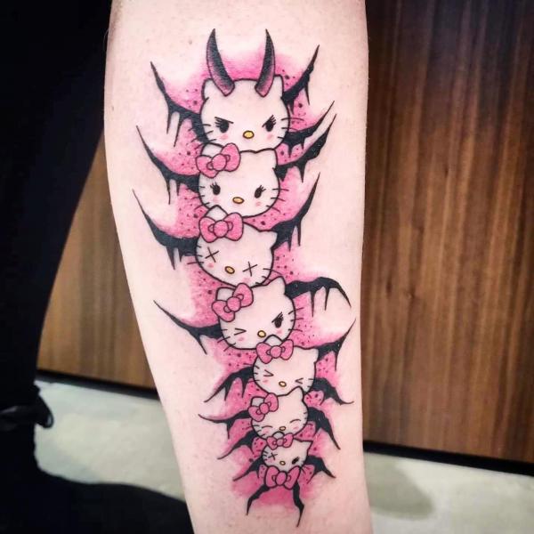 hello kitty centipede tattoo leg